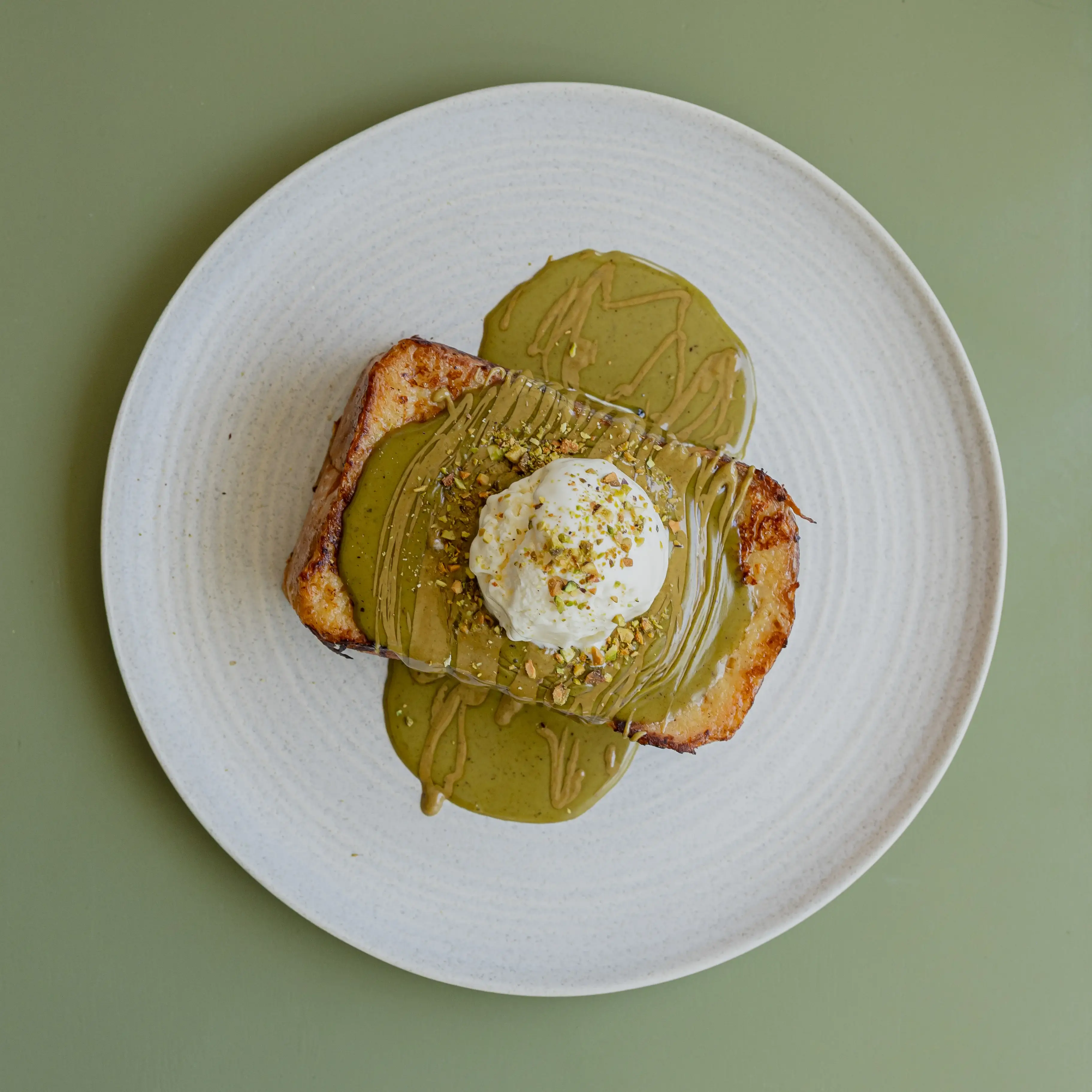 Brioche French toast, pistachio butter, vanilla ice cream, cinnamon sugar
